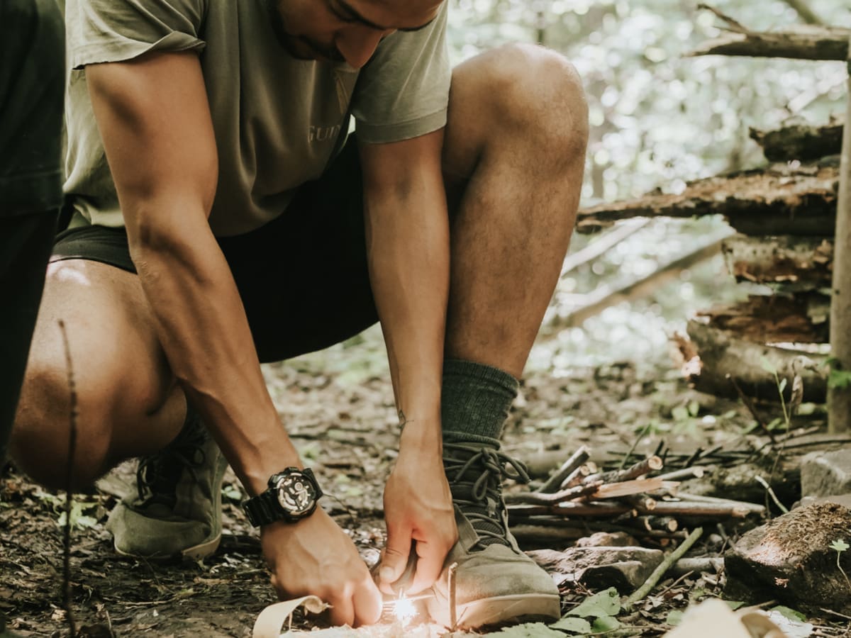 Elev8 Council members practising fire starting techniques